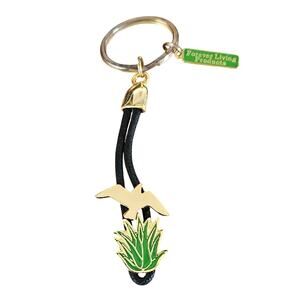 Forever Living Products Goldtone and Green Keychain with Seagull and Plant Purse